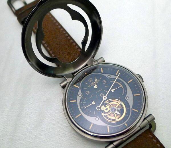 The timepiece is very distinctive with the titanium cover.