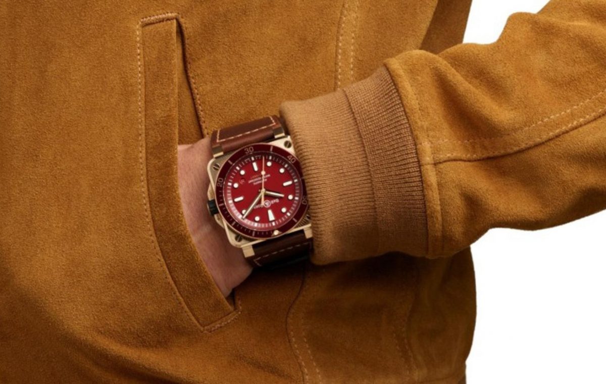 The red dial fake watch is designed for men.
